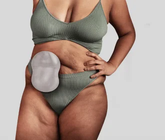 a woman holding a baby