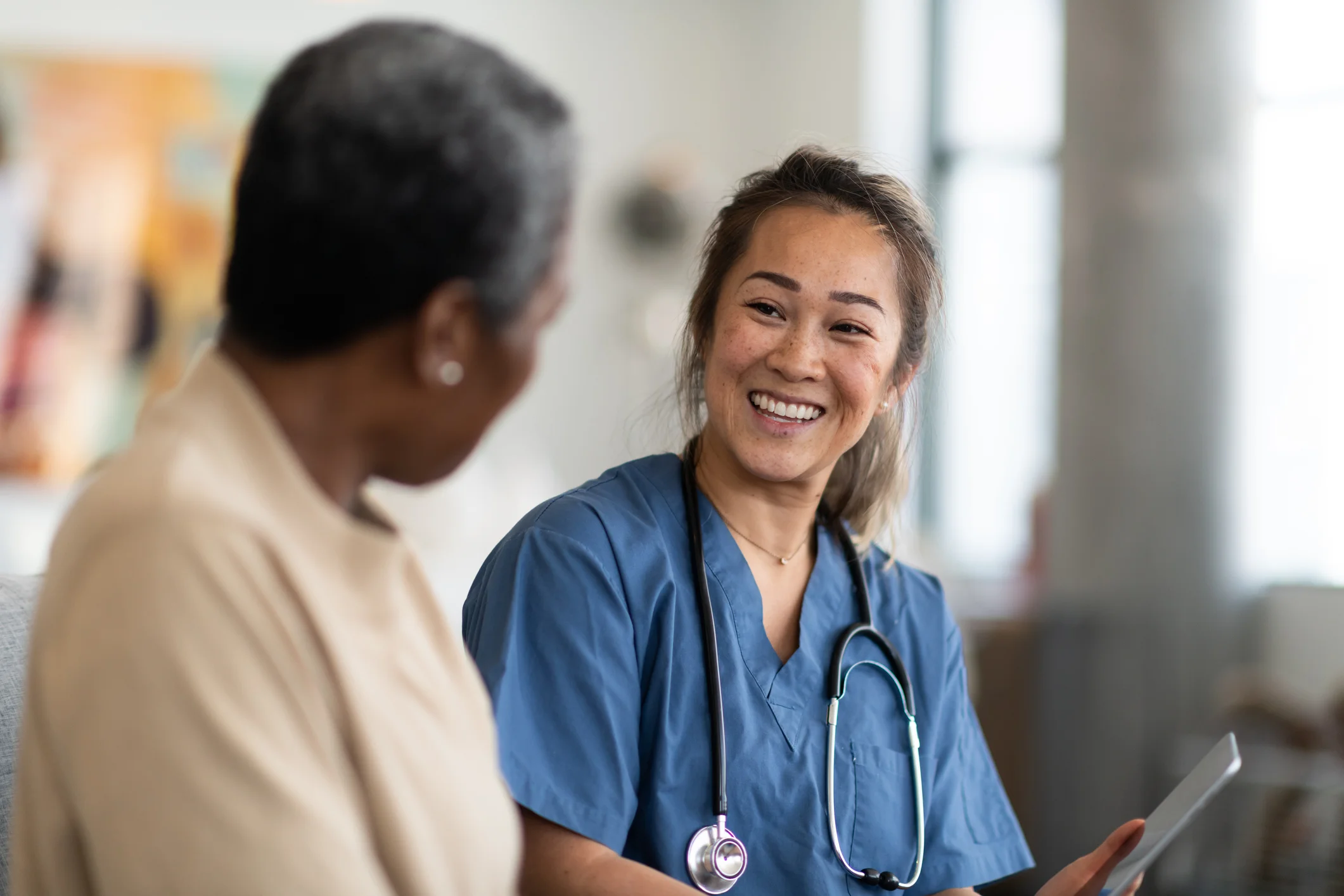 a doctor talking to a patient