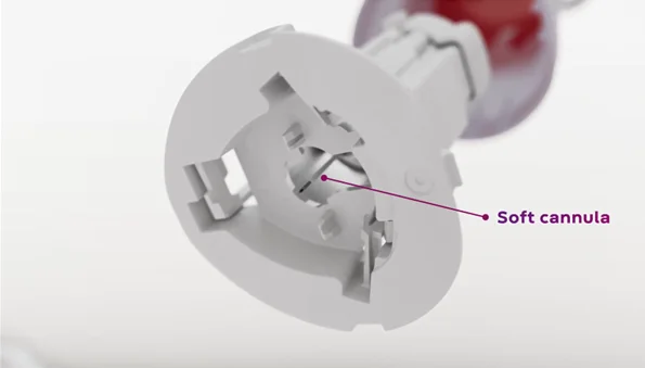 a white cord plugged into a white wall