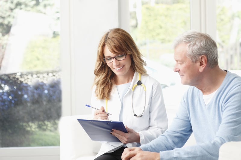 a female HCP talking to male patient